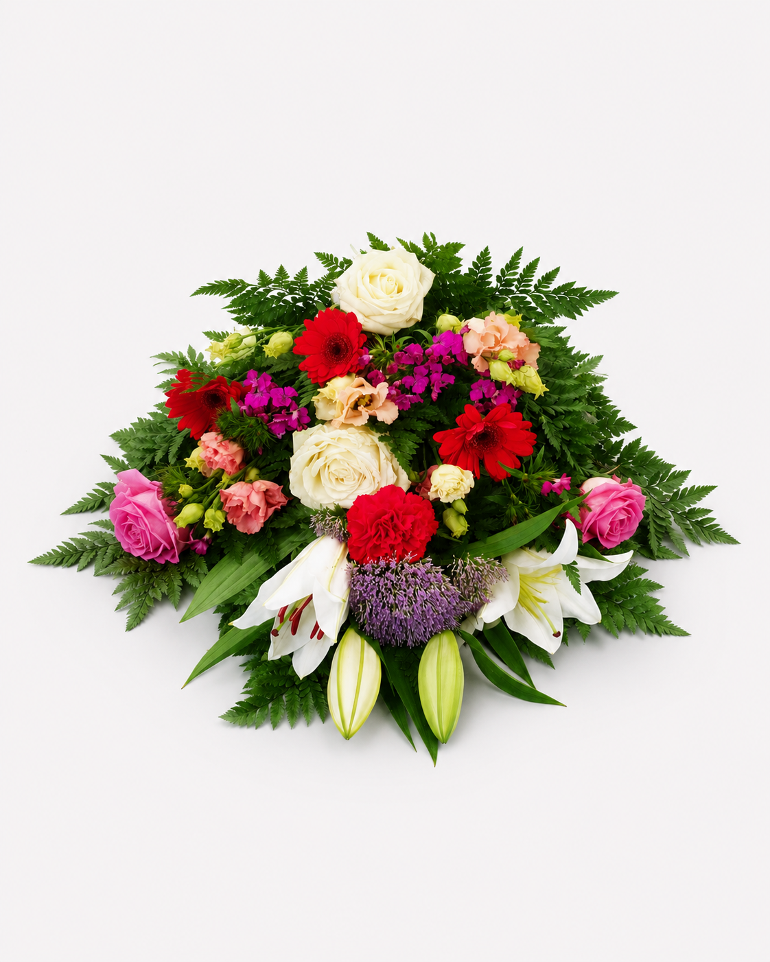 Bårebuket med hvide liljer og farverige blomster